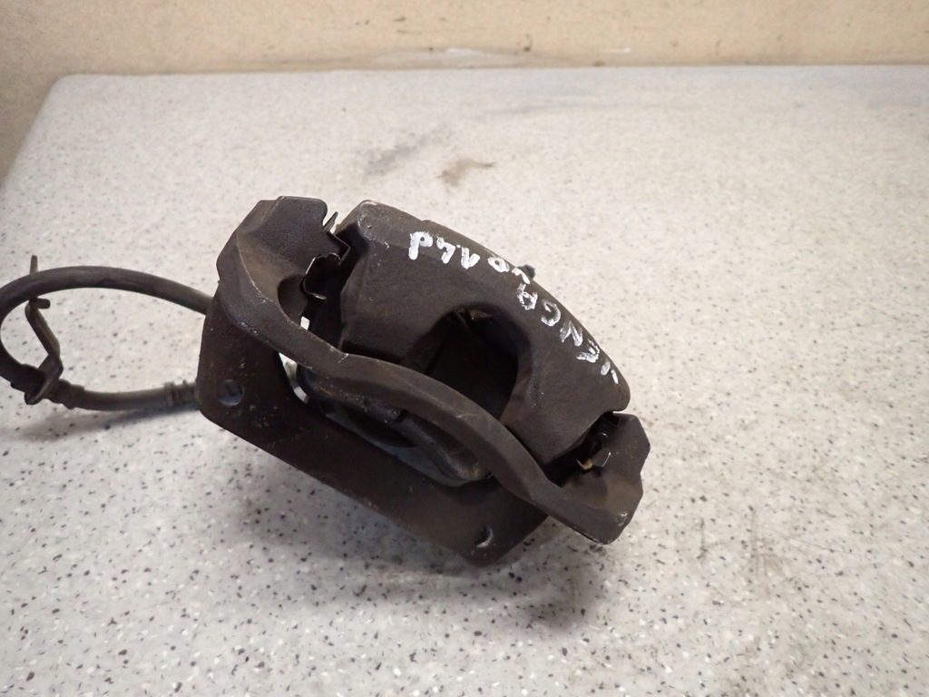 фото №4, Kia venga 09- суппорт тормозной передний правый