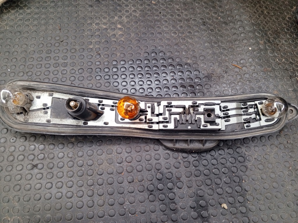 фото №1, Вкладиш лампи задній цоколь лампочка fiat panda ii 28029008 лівий