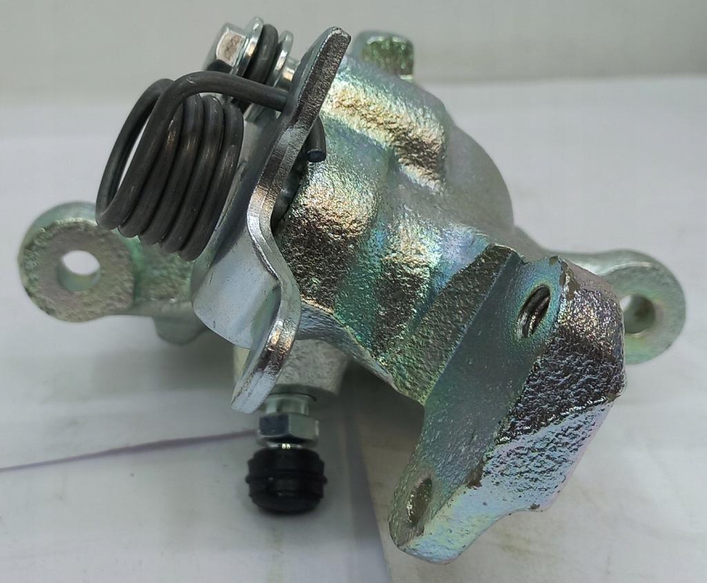 фото №3, Супорт гальмівний osi задня лівий nissan primera 1996-