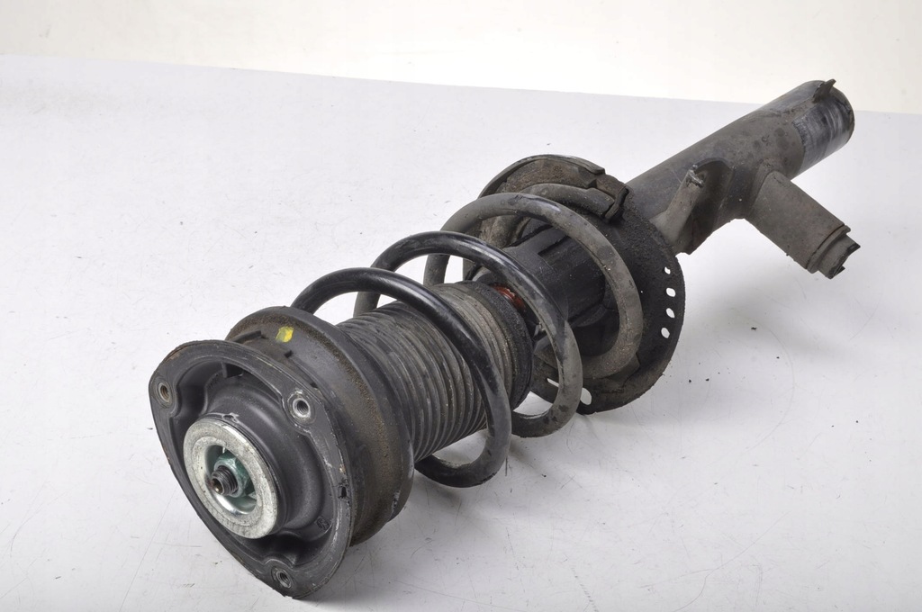 фото №1, Leon iii lift амортизатор лівий перед 5q0413031fm