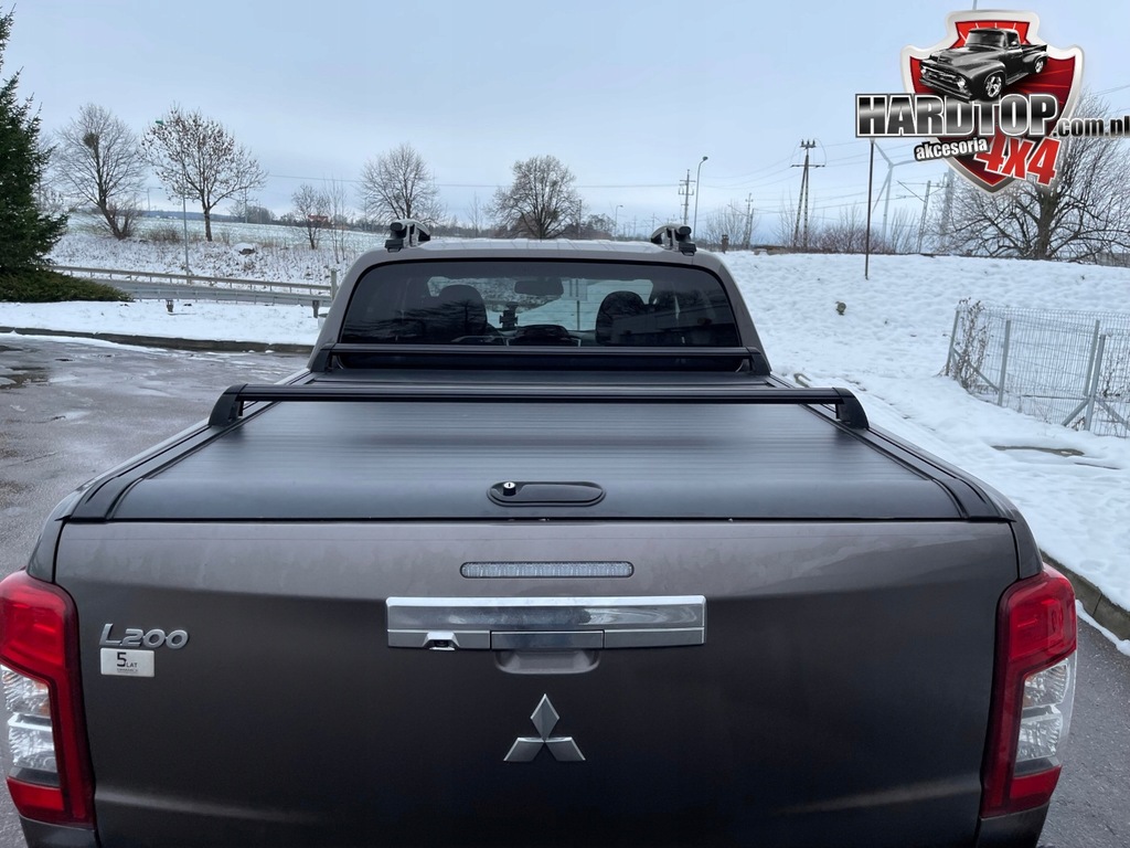 фото №8, Шторка mitsubishi l200 оригінальна рейлінги балка