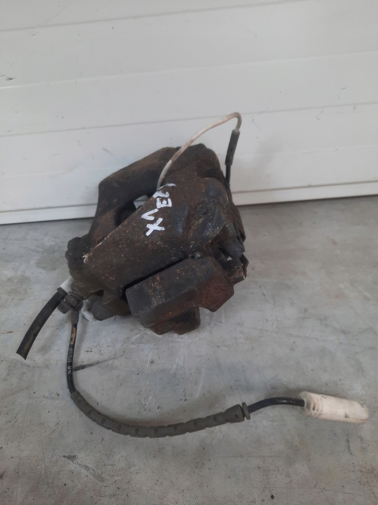 фото №5, Супорт гальмівний лівий перед bmw x1 e84