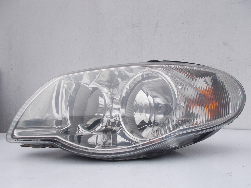 фото №7, Фара лампа chrysler voyager iv lift левый