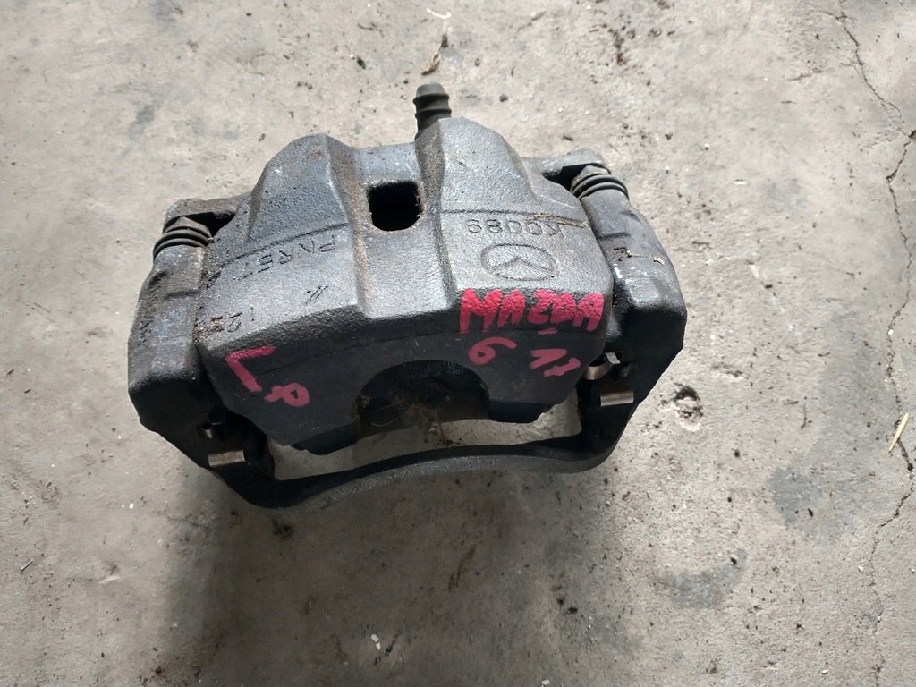 фото №1, Mazda 6 gj 12- суппорт тормоза правый перед скоба