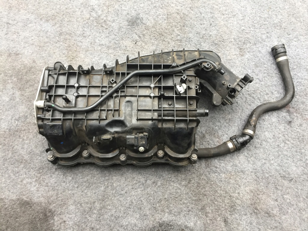 фото №1, Bmw оригинальный номер 72344186 радиатор коллектор впускной