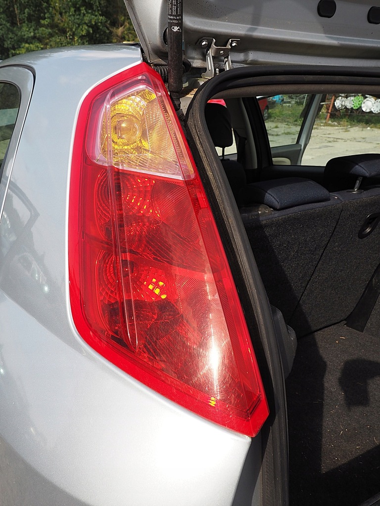 фото №3, Grande punto лампа ліва задня задня