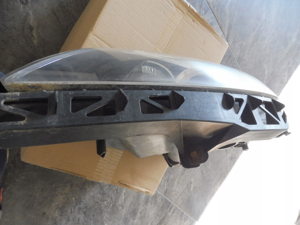 фото №5, Лампа ліва перед mazda 3 bk 1,6 5d hb