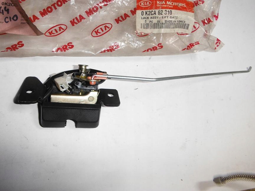 фото №1, Замок кришки задня kia carens i