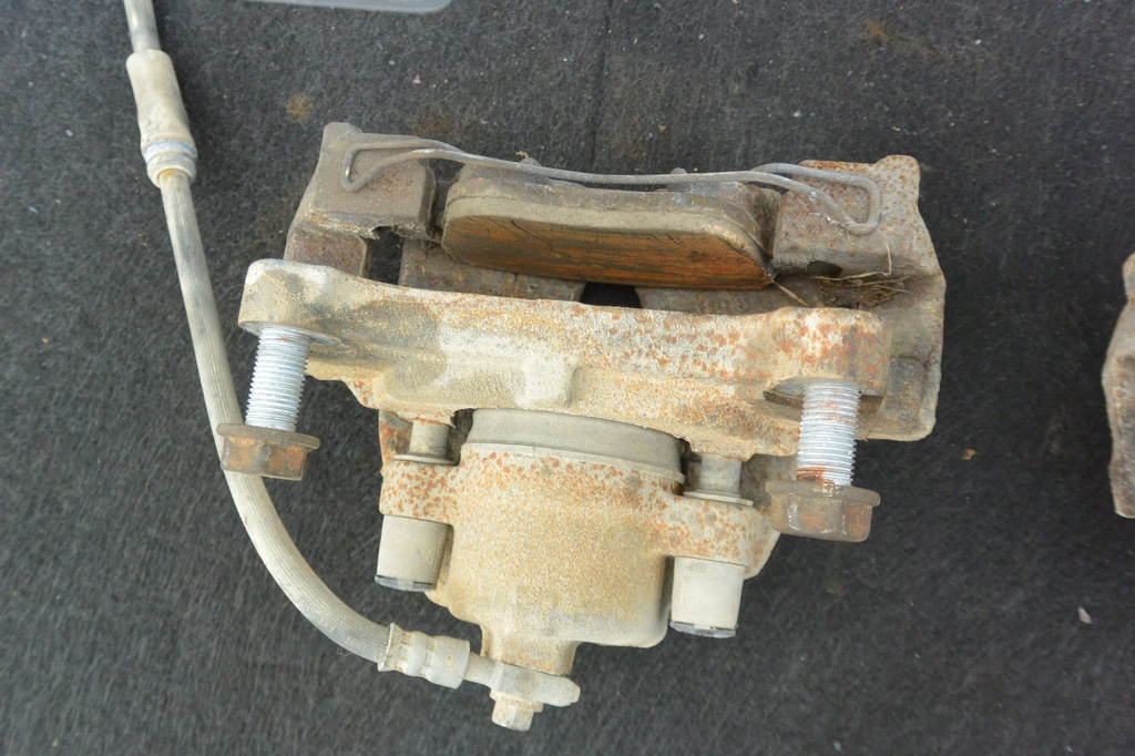 фото №6, Суппорт тормозной перед левый правый vw passat b7 usa