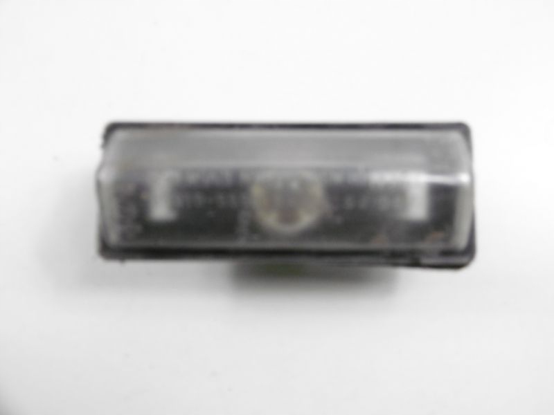 фото №1, Liana 01-04 лампа освещение номерного знака sedan 4d