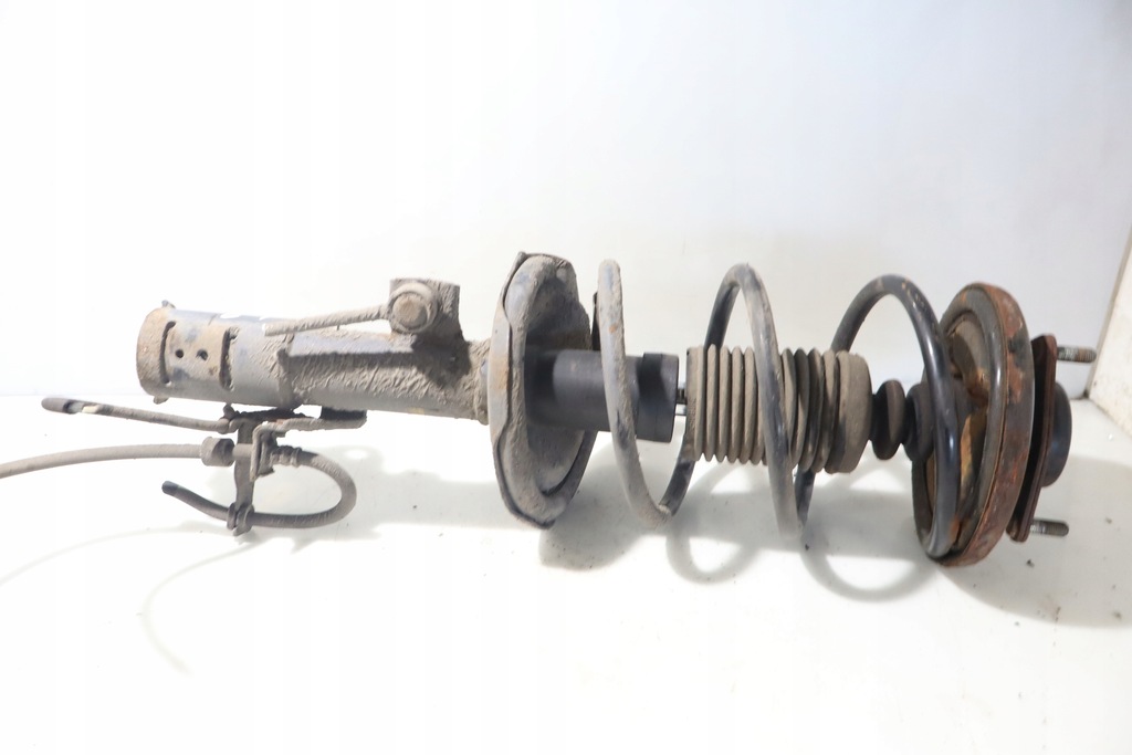 фото №1, Амортизационная стойка левый перед lancer viii 1.6 16v