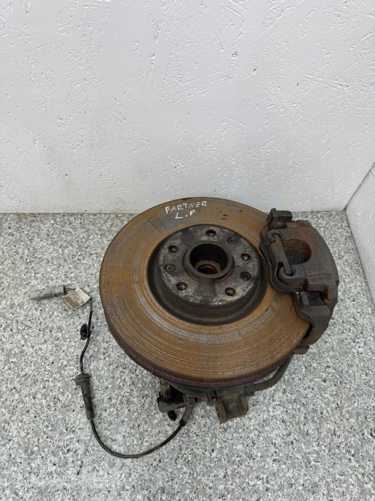 Купити Поворотний кулак лівий перед combo e iv berlingo iv partner iv