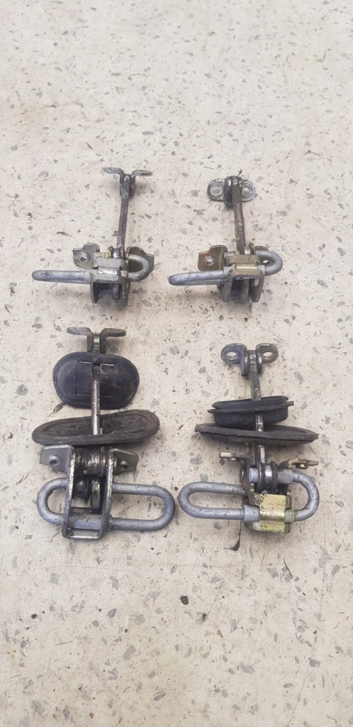 фото №1, Обмежувач двері перед alfa romeo 166