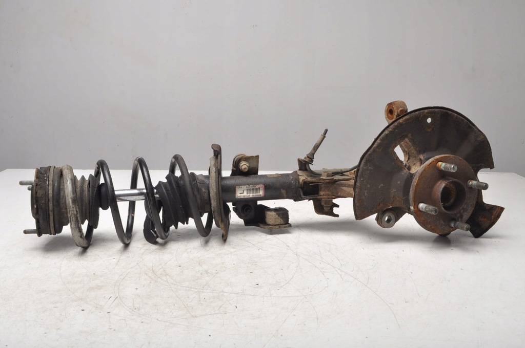 фото №1, Mazda 2 de амортизационная стойка левый перед 2a21381