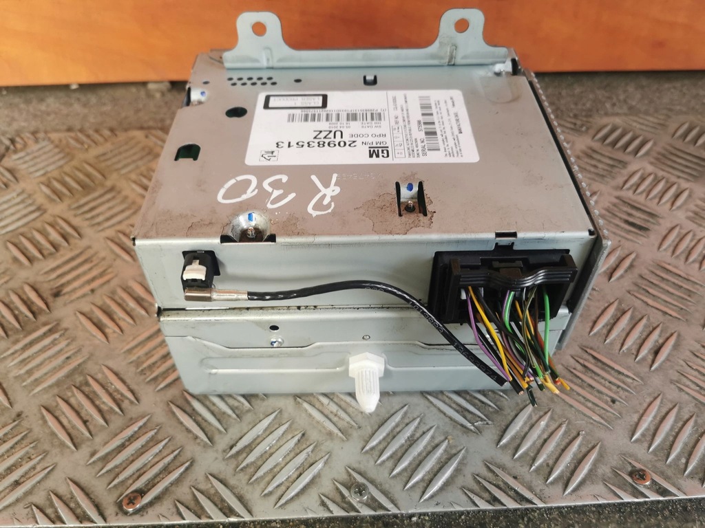 фото №2, Opel astra j оригинальный номер радио cd 20983513