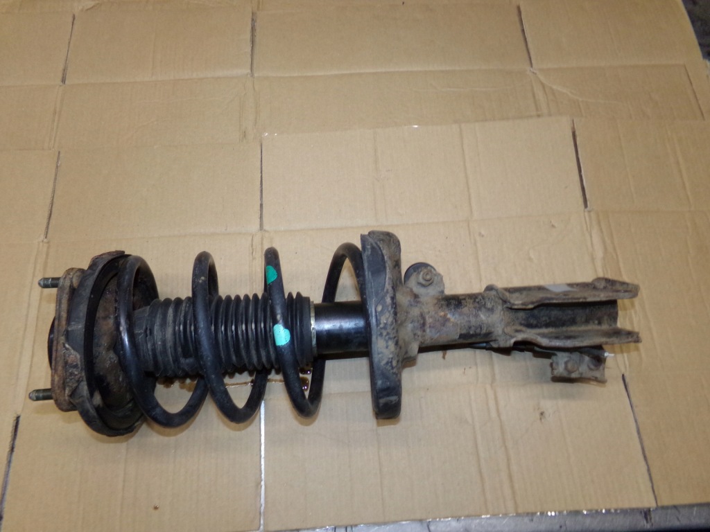 Купить Амортизатор перед пружина mazda 323 1.6 b