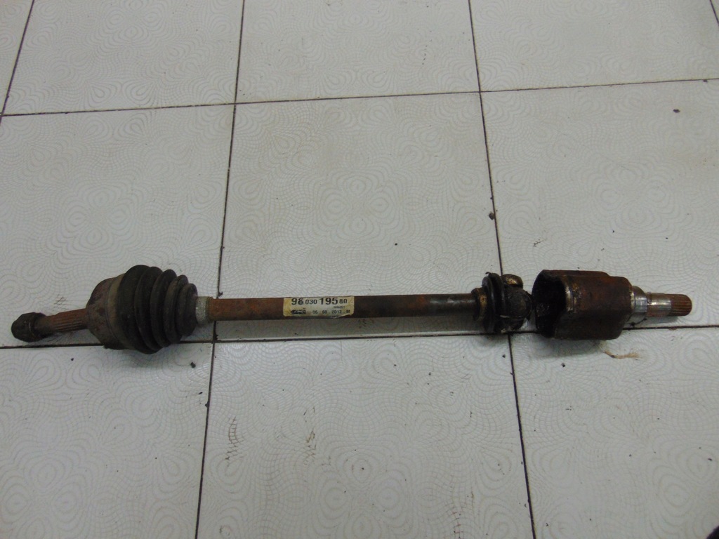 фото №1, Приводной вал левая peugeot 208 1.4hdi 9803019580
