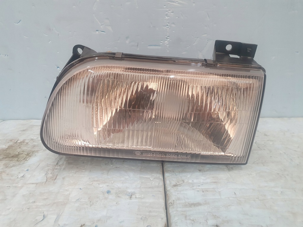 фото №1, Лампа kia pride lift ліва перед передня 93- nowa