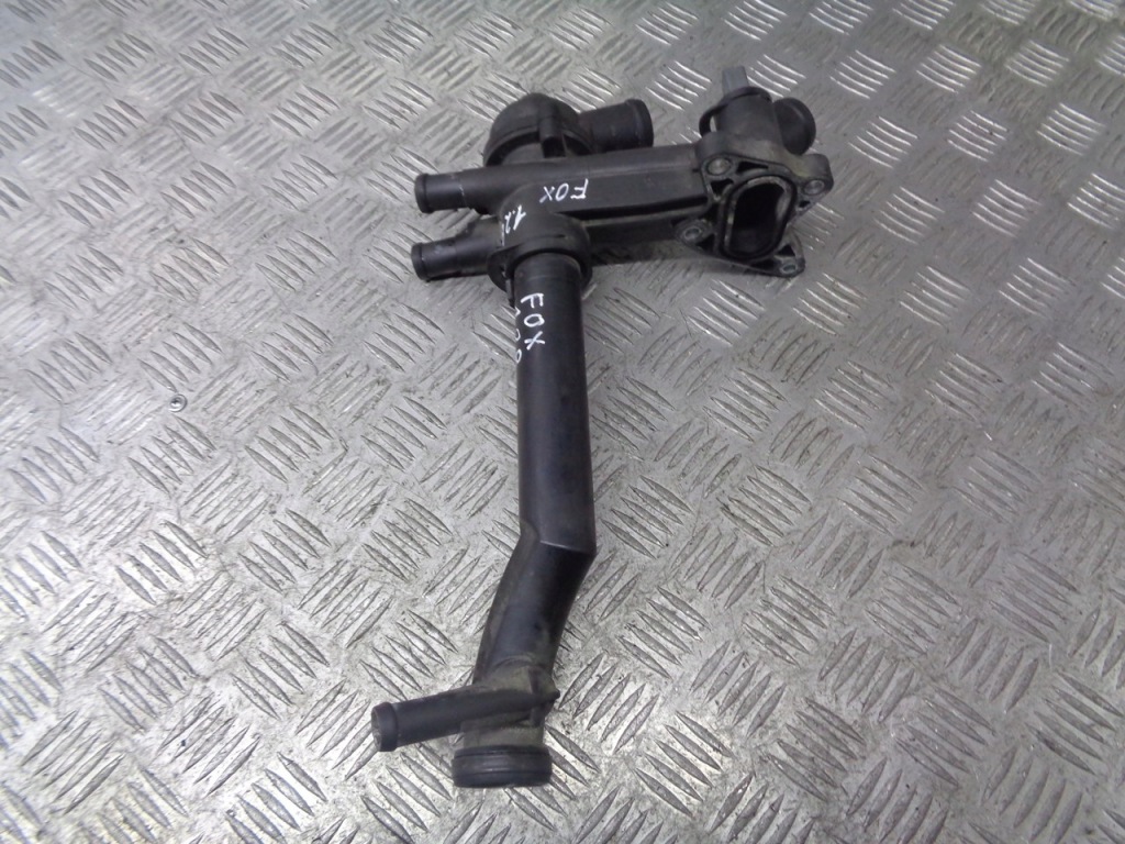 фото №1, Корпус термостата vw fox 1.2 03c121111b