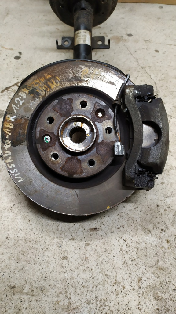 фото №1, Qashqai j11 амортизационная стойка поворотный кулак правый перед 1.2 t