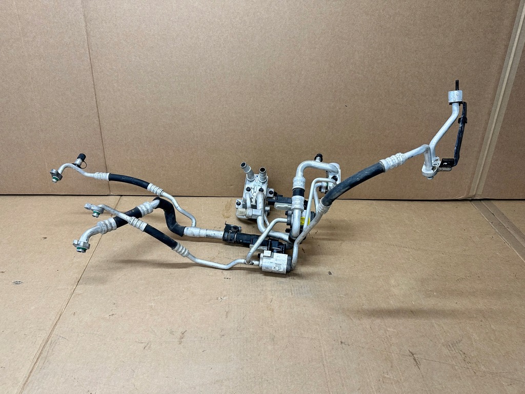 фото №1, Hyundai ioniq 5 клапан розширювальний трубки кондиціонера 976e2gi500