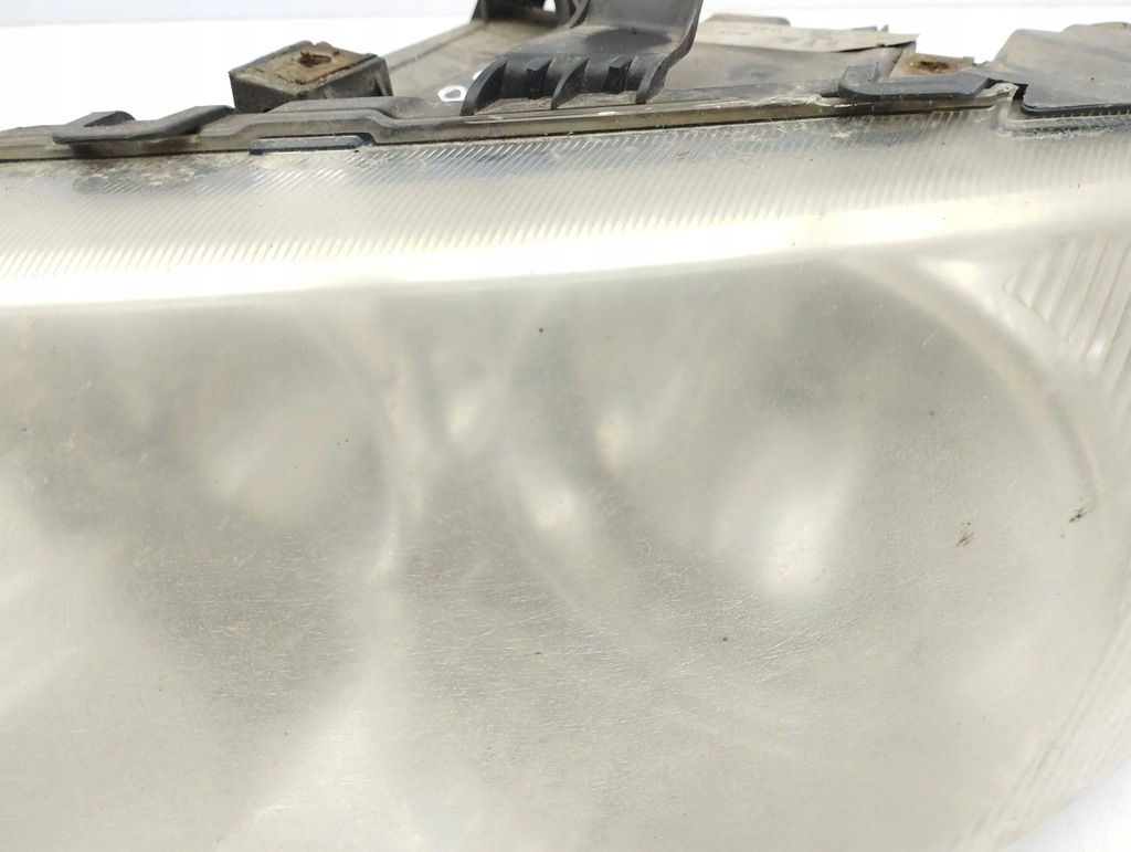 фото №7, Chrysler voyager 2006 ліва сторона лампа передня