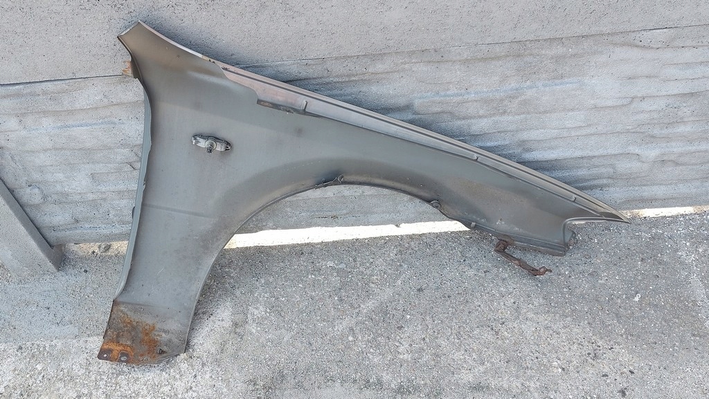 фото №7, Mazda 323f b3 12m крыло передний левый