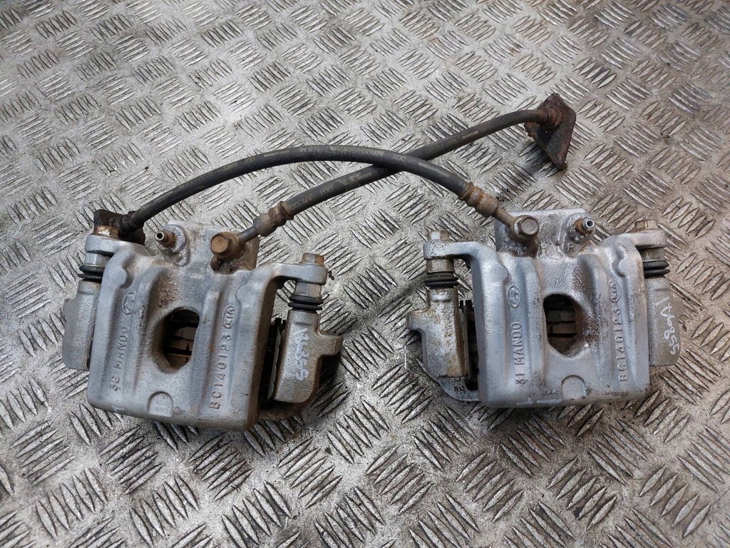 фото №1, Супорт гальмівний лівий задня + правий задня santa fe iii