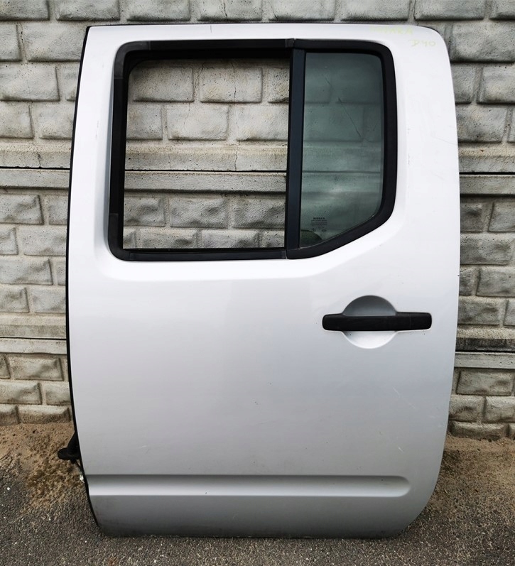 фото №1, Nissan navara d40 дверь левая задняя полный