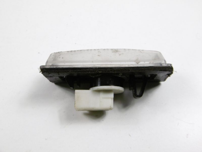 фото №5, Liana 01-04 лампа освещение номерного знака sedan 4d