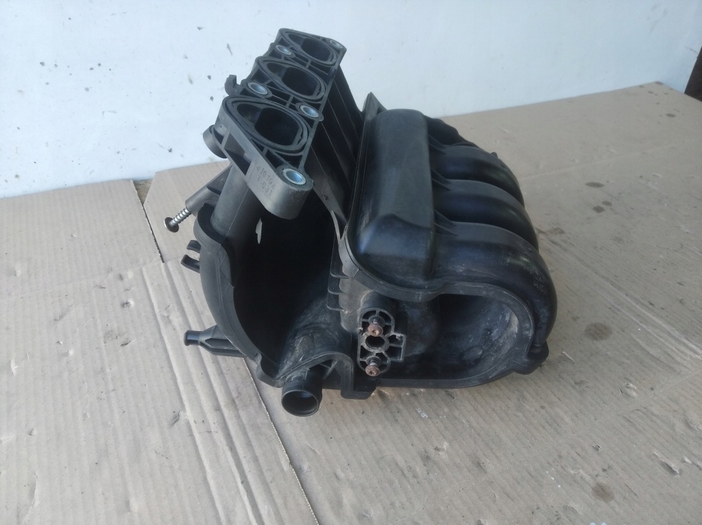 Колектор впускний  двигуна vw audi seat skoda 1,2b 12v 03e129711c Недорого