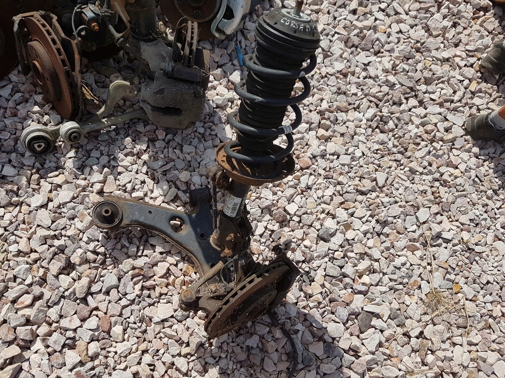 фото №1, Opel corsa d 1.3 амортизатор поворотный кулак правая перед