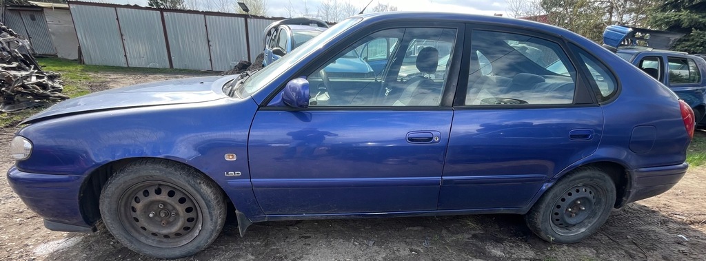 фото №5, Toyota corolla viii e11 lift fl колір 8l5 бампер перед