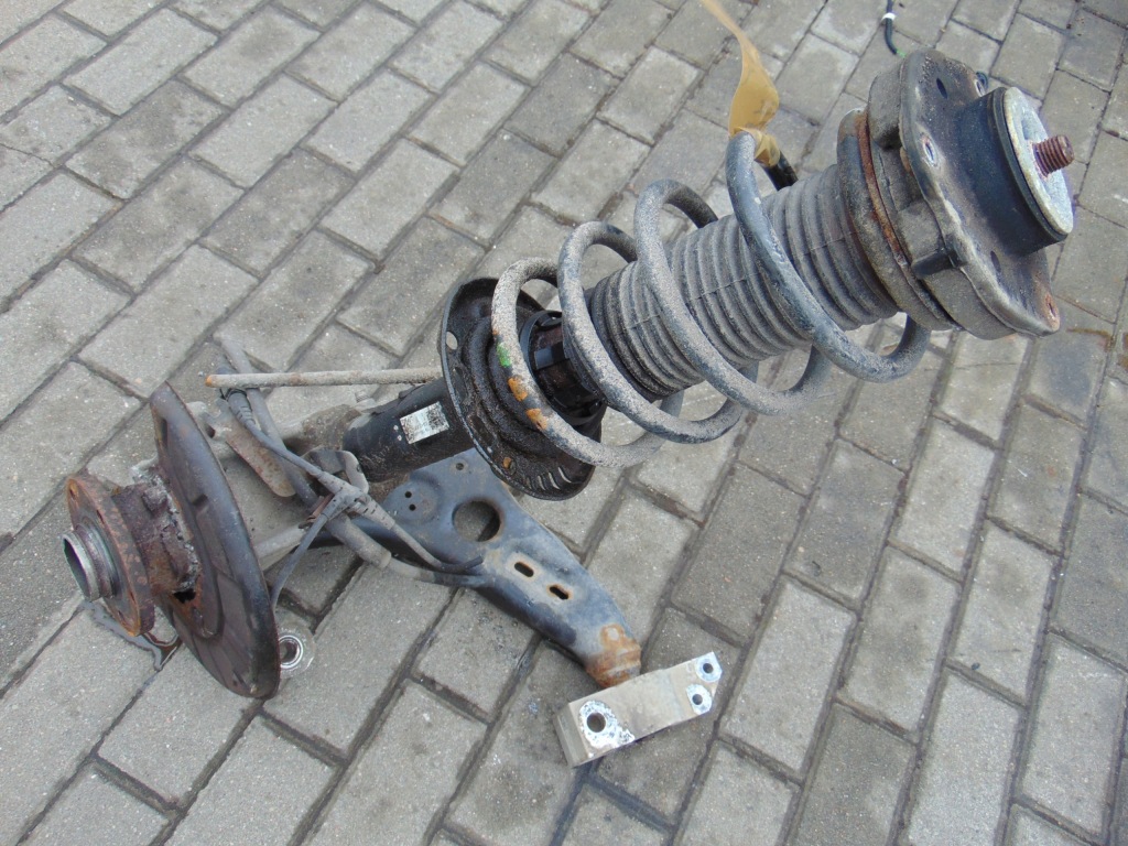 фото №1, Поворотный кулак mcperson левый перед vw passat b7 1.4tsi