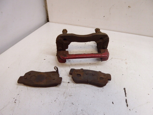 фото №1, Tucson i 04-10 скоба рамка супорт задня правий 2.0 16v g4gc