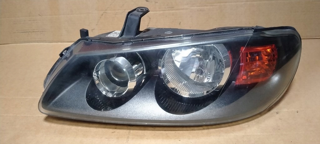 фото №1, Nissan almera n16 lift 03-06 фара левый перед