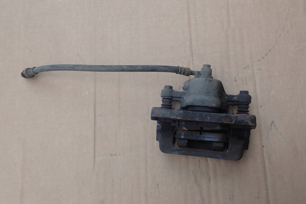 фото №4, Hyundai trajet супорт гальмівний задній лівий