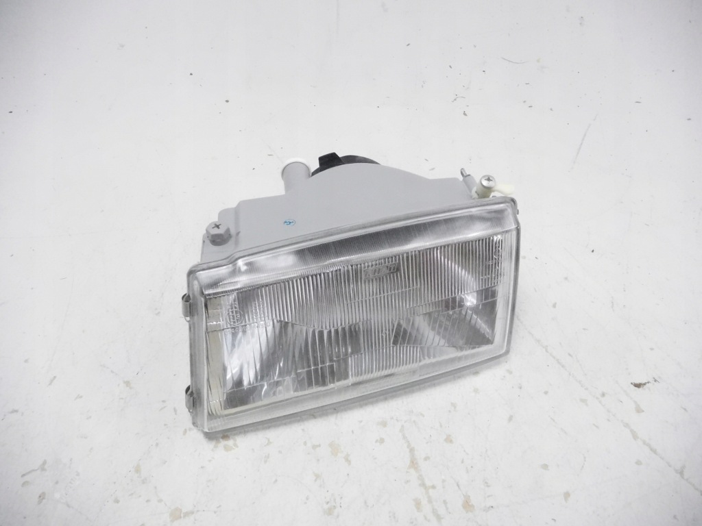 Фара лівий перед з поворотник fiat mille uno оригінальний номер 7642686 Зі Шроту