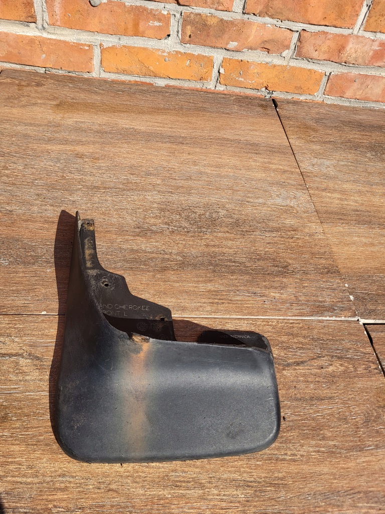 фото №1, Jeep grand cherokee wk 5-10 брызговик левый перед