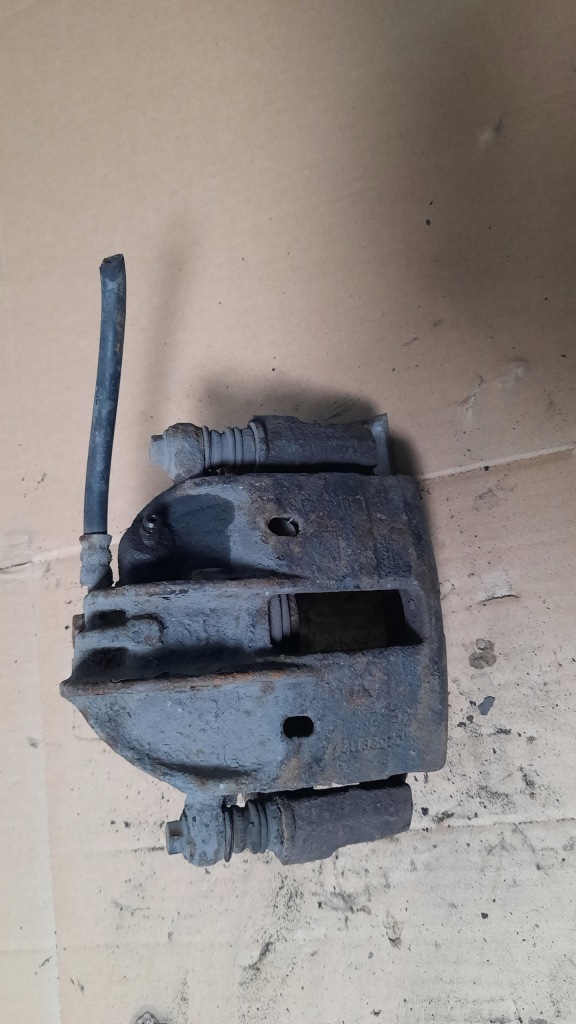 фото №1, Супорт гальмівний лівий перед volvo s40 03r