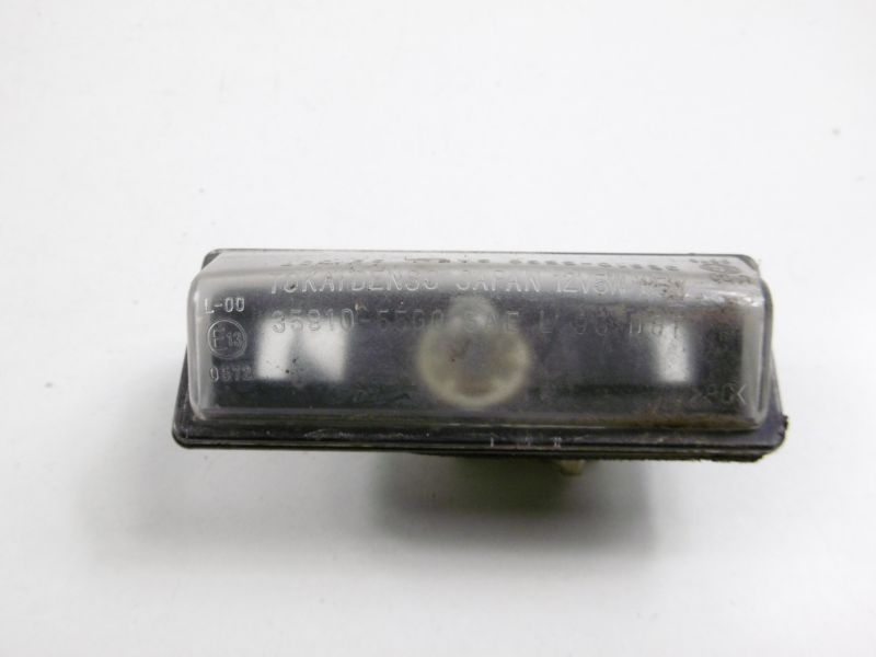 фото №9, Liana 01-04 лампа освещение номерного знака sedan 4d