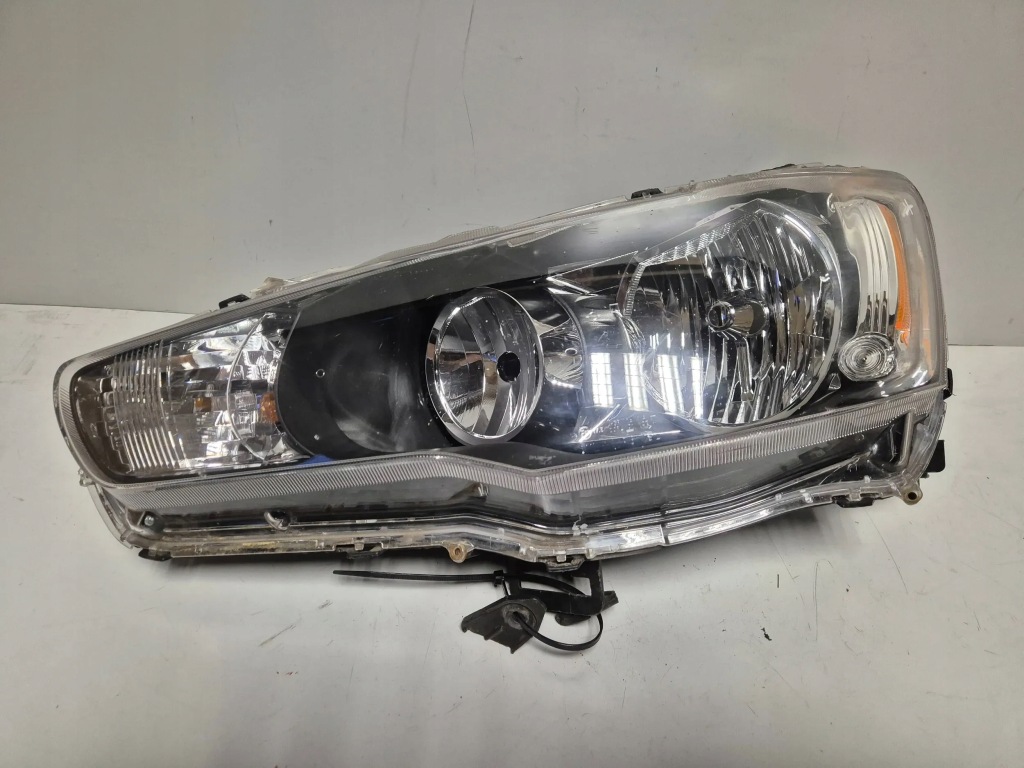 фото №1, Mitsubishi lancer 8 viii evo x 07r- лампа ліва фара лівий перед