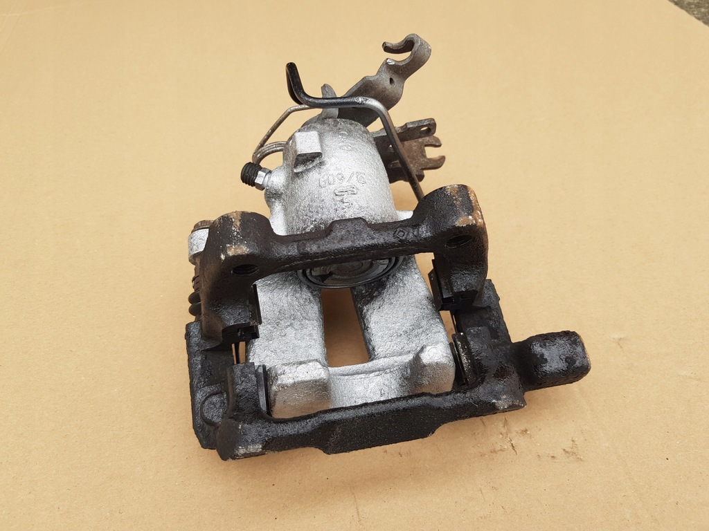 фото №14, Супорт гальмівний + скоба лівий задня / vw caddy iii / 41mm 256mm перевірений