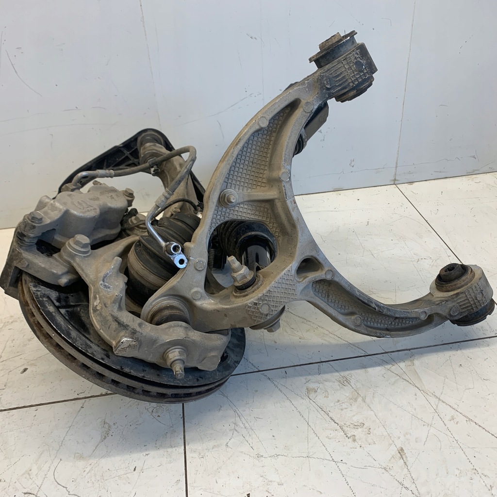 фото №11, Поворотный кулак левая перед рычаг приводной вал суппорт ступица dodge ram v 4x4 5.7 hemi 22r