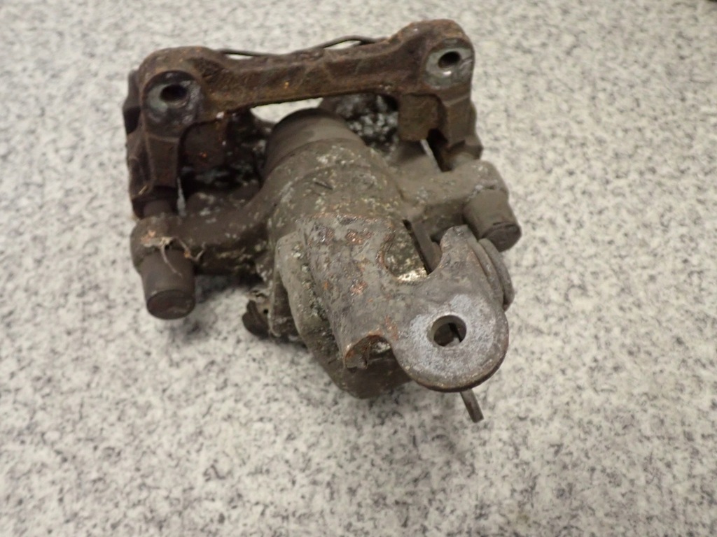 фото №5, Primera p12 1.9 dci 02-07 суппорт задний правый