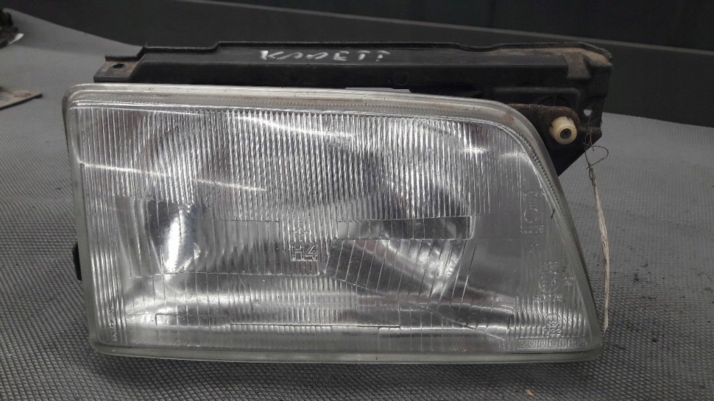 Купить Фара правый opel kadett e carello