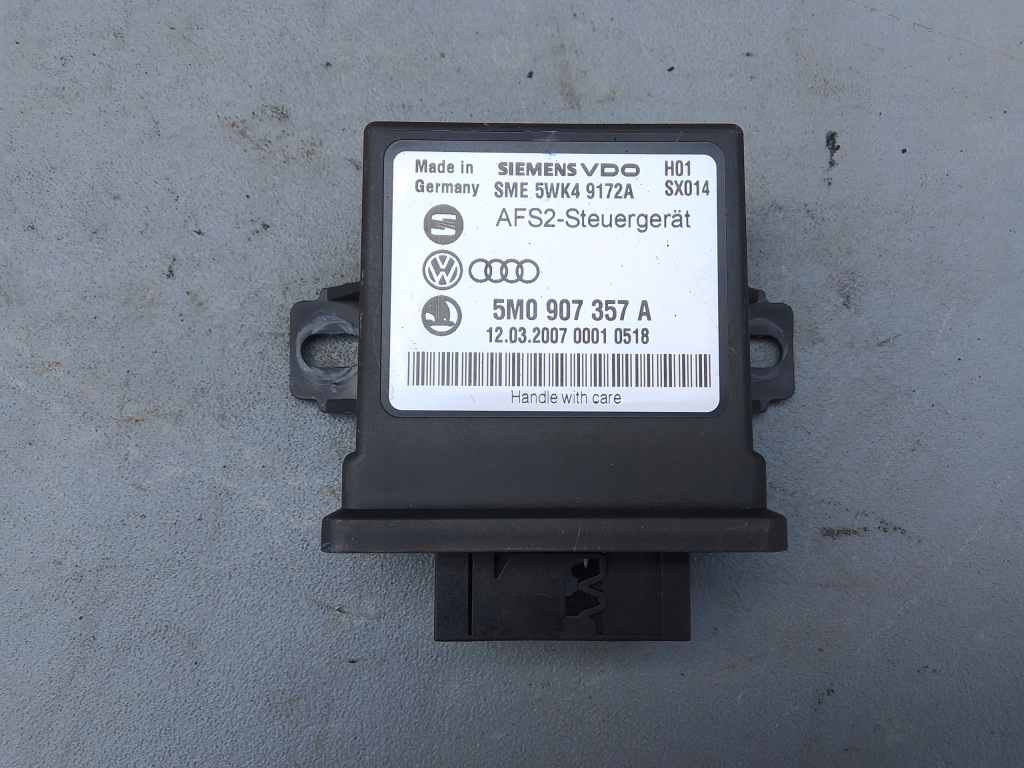Купити Модуль світла vw passat b6 5m0907357a