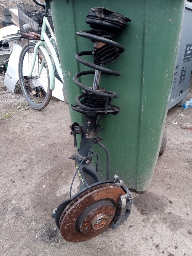 фото №1, Qashqai j11 поворотный кулак амортизатор правый