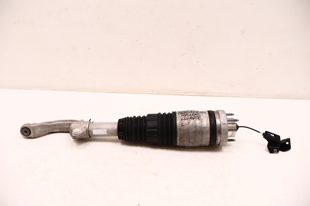 фото №1, Maserati levante амортизатор левый перед 06701007170