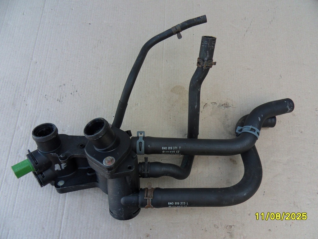 фото №1, Корпус термостата volkswagen оригінальний номер 032121111bb